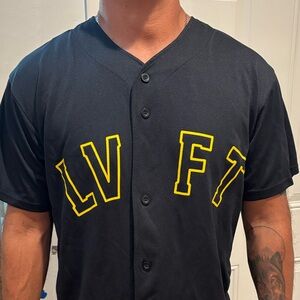 Black Shirt with Yellow Lettering